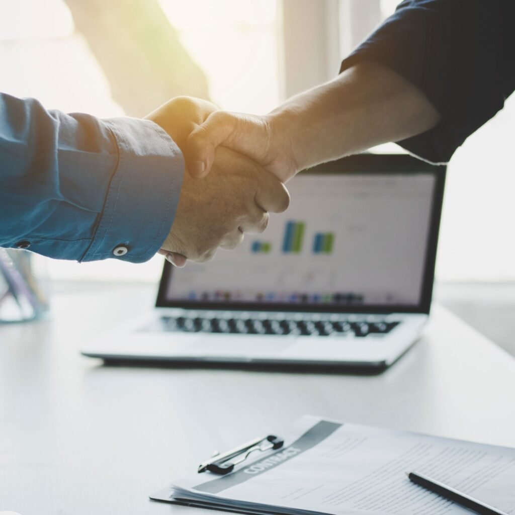 Business professionals discussing a bookkeeping and financial services agreement