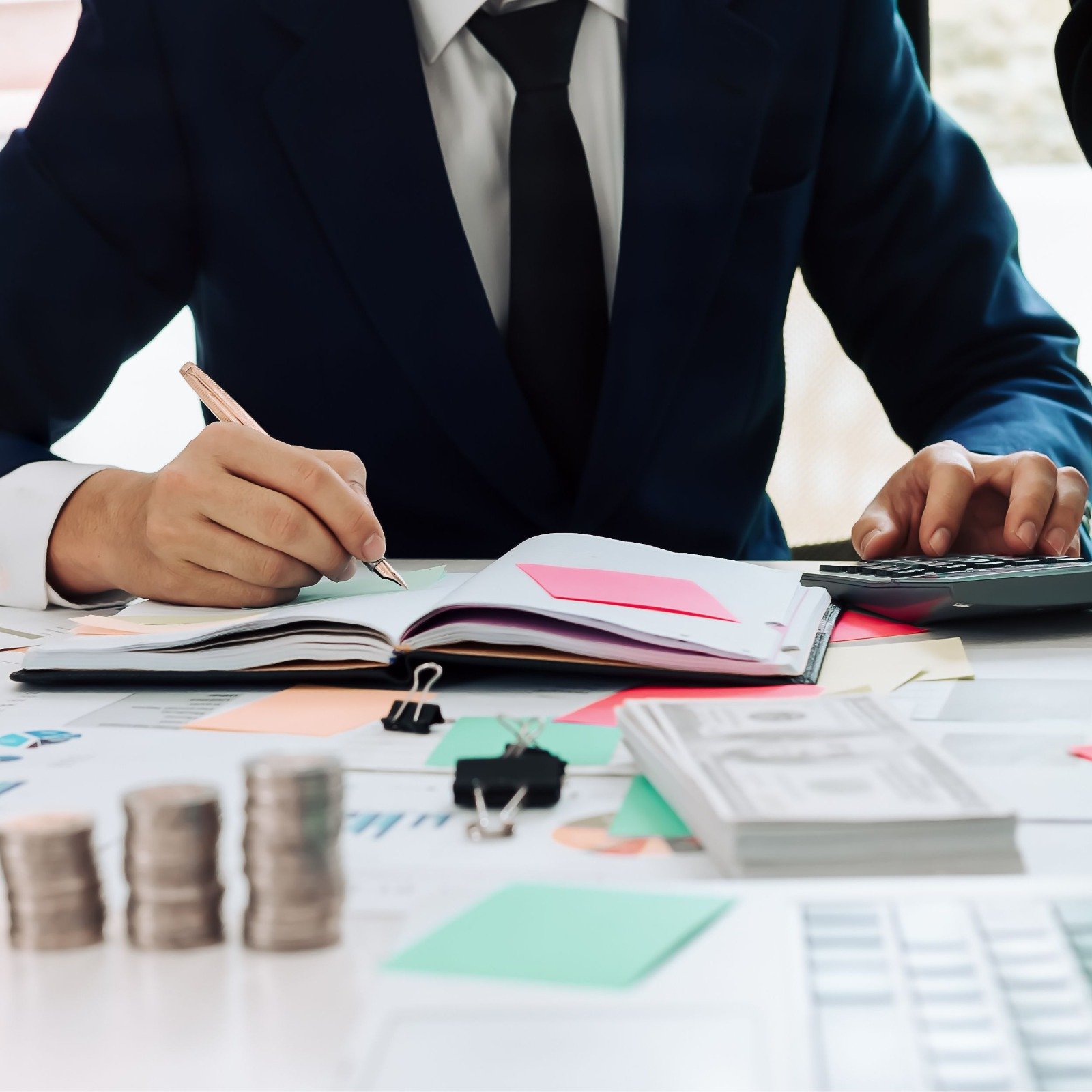 Accountant reviewing business financial documents and bookkeeping records